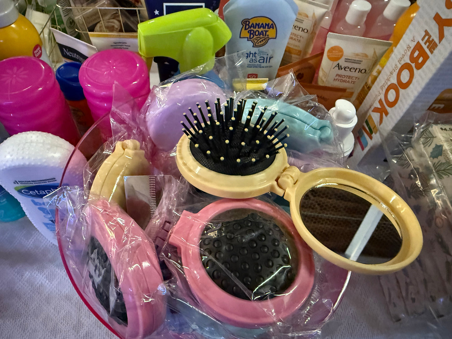 Ultimate on-the-go Grooming Companion – our Mini Folding Hair Brush with Mirror
